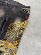 Karakuri black tab jeans with full dragon embroidery. Size 34–36.